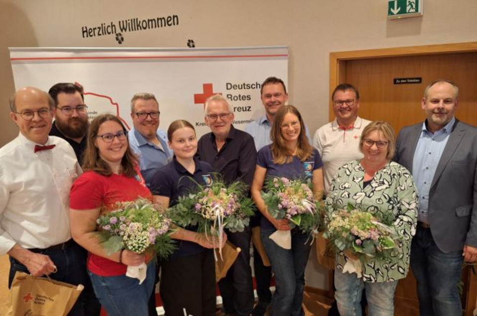 Gruppenbild mit elf Personen